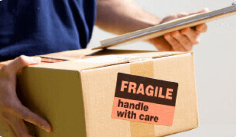 Image of a courier man holding a package and a delivery register to portray the company United Parcel Service (UPS)